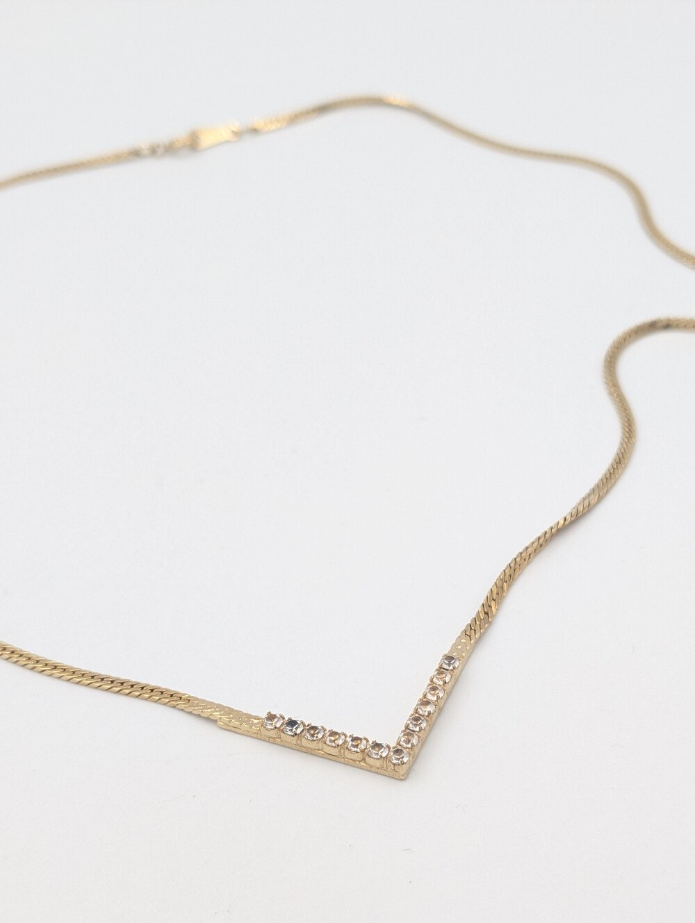 Vintage Avon gold tone rhinestone V chain necklace